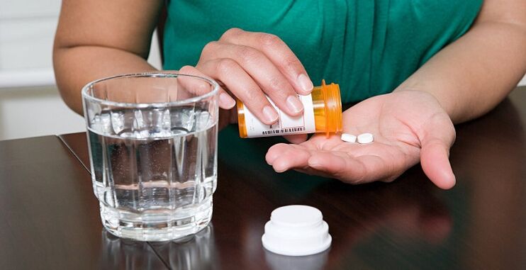 Nehmen Sie Tabletten, um Schmerzen im unteren Rücken zu lindern